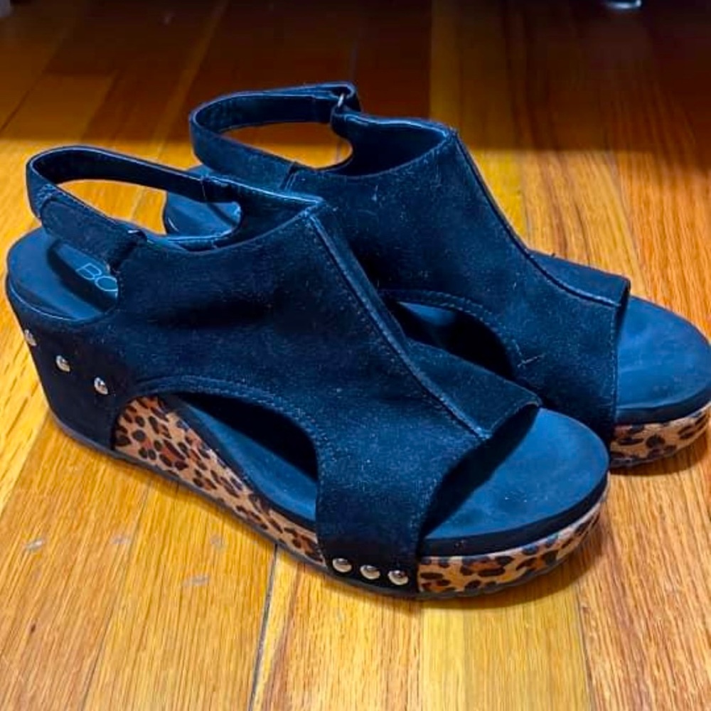 Black and leopard wedged heeled sandals.
